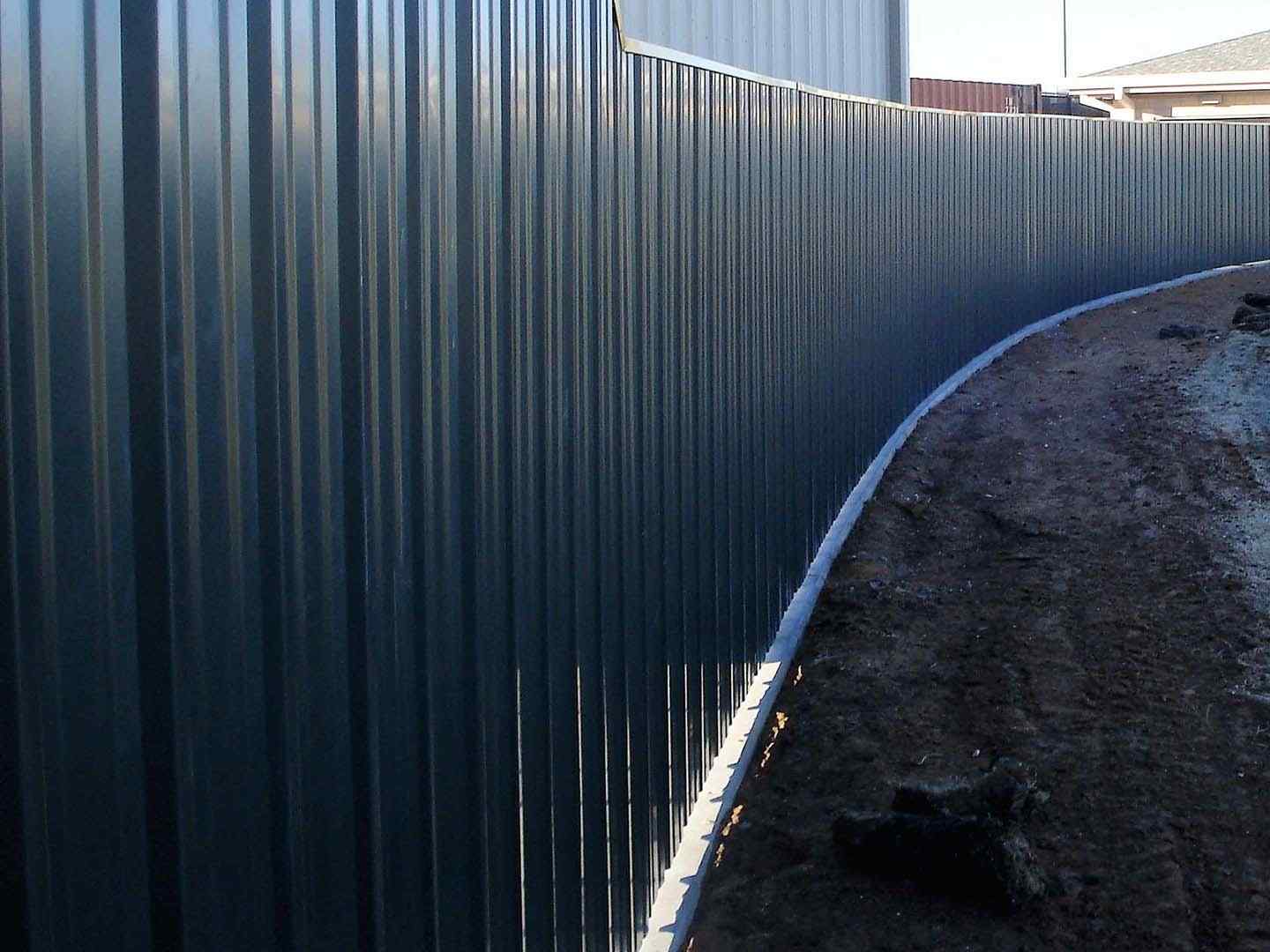 Photo of a R-Panel fence from a Texas fence company
